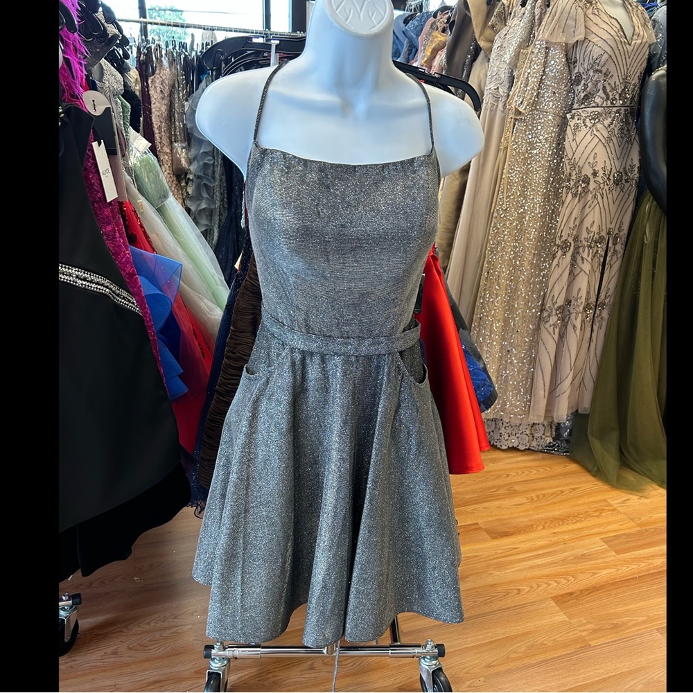 Short a-line gunmetal silver dress size 8 with pockets with tie up back
